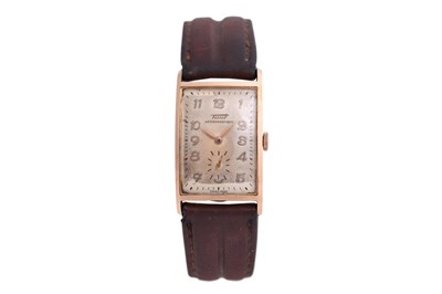 Lot 128 - A MEN'S TISSOT 14K ROSE GOLD MANUAL WRISTWATCH.