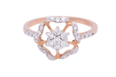 Lot 11 - A DIAMOND-SET ROSE GOLD FLORAL RING