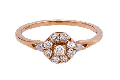 Lot 33 - A YELLOW AND WHITE DIAMOND-SET YELLOW GOLD HALO RING