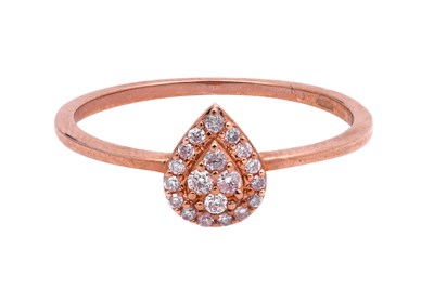 Lot 6 - A PINK DIAMOND-SET ROSE GOLD TEAR DROP RING