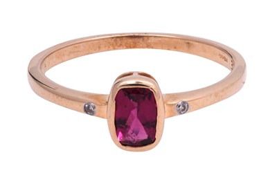 Lot 14 - A RUBELLITE AND ZIRCON-SET YELLOW GOLD RING