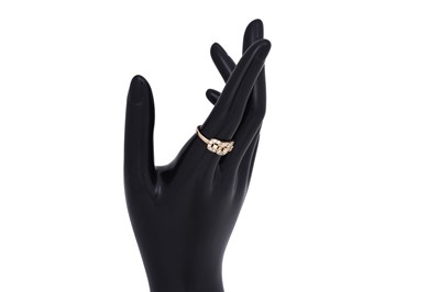 Lot 15 - A YELLOW DIAMOND-SET YELLOW GOLD RING
