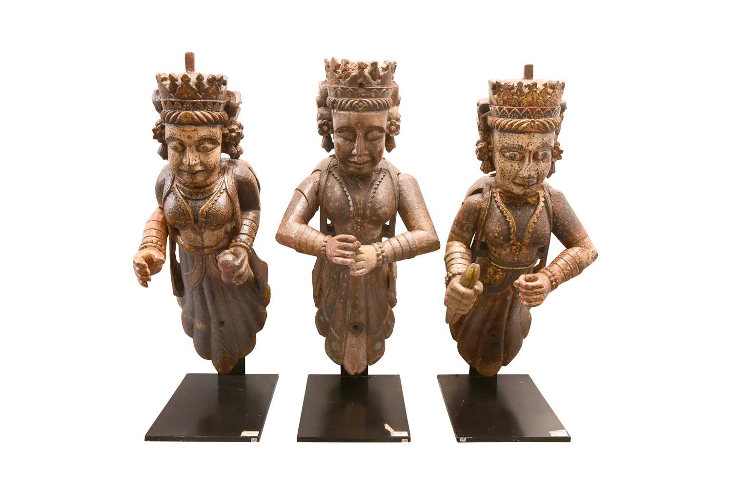 Lot 64 - THREE POLYCHROME-PAINTED CARVED WOODEN ARCHITECTURAL SUPPORT FIGURES