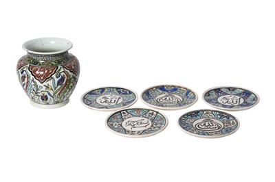 Lot 400 - FIVE POLYCHROME-PAINTED TURKISH KUTAHYA-STYLE POTTERY SAUCERS AND A VASE