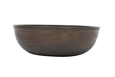 Lot 373 - AN ENGRAVED BRONZE QAJAR DRINKING CUP