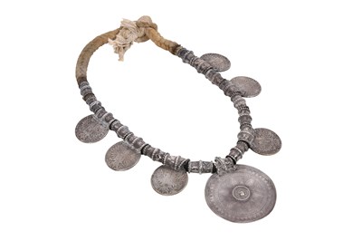 Lot 430 - AN OMANI SILVER THALER NECKLACE