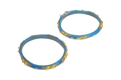 Lot 47 - A PAIR OF EARLY ISLAMIC GLASS BRACELETS