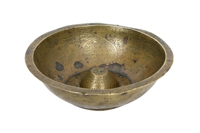 Lot 377 - AN ENGRAVED BRASS ‘MAGIC’ BOWL