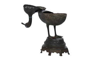 Lot 370 - A ZAND-STYLE QAJAR DUCK-SHAPED BRASS INCENSE BURNER