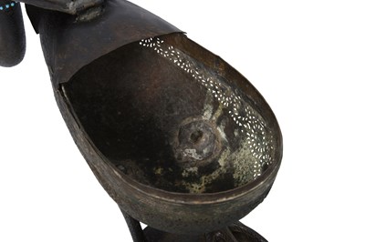 Lot 370 - A ZAND-STYLE QAJAR DUCK-SHAPED BRASS INCENSE BURNER