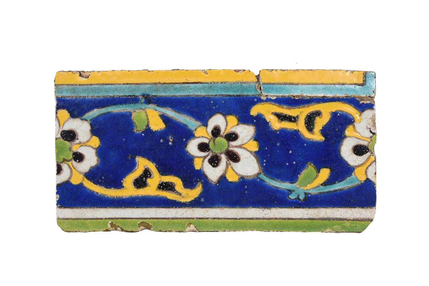 Lot 352 - A SAFAVID CUERDA SECA POTTERY BORDER TILE