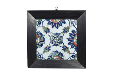 Lot 358 - AN IZNIK POTTERTY TILE WITH FLORAL MOTIFS