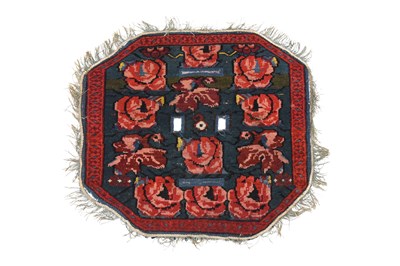 Lot 410 - A RARE OCTAGONAL SADDLE POMMEL CARPET COVER