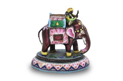 Lot 324 - A POLYCHROME-ENAMELLED SILVER INDIAN SCULPTURE OF AN ELEPHANT WITH MAHOUT