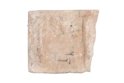 Lot 349 - A FRAGMENTARY SAFAVID CUERDA SECA CALLIGRAPHIC POTTERY TILE