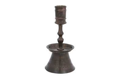 Lot 397 - A SMALL BRONZE CANDLESTICK WITH WESTERN ARMENIAN INSCRIPTION