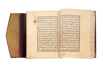 Lot 65 - AN ILLUMINATED OTTOMAN QUR’AN