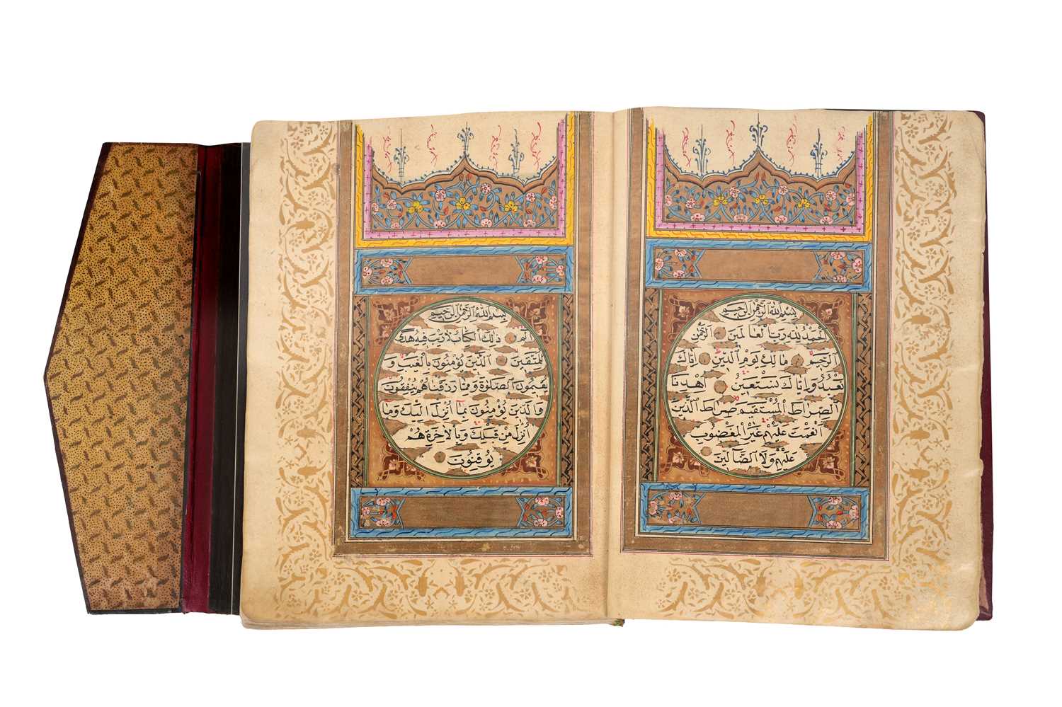 Lot 65 - AN ILLUMINATED OTTOMAN QUR’AN