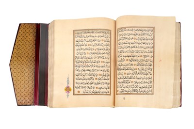 Lot 65 - AN ILLUMINATED OTTOMAN QUR’AN