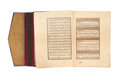 Lot 65 - AN ILLUMINATED OTTOMAN QUR’AN