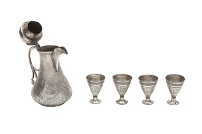 Lot 241 - A CHASED EGYPTIAN SILVER COFFEE POT AND FOUR ENGRAVED SILVER ZARF CUPS