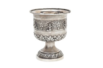 Lot 113 - AN ANGLO-INDIAN UNMARKED MADRAS SILVER REPOUSSÉ CHALICE