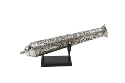 Lot 175 - AN ENGRAVED SILVER MINIATURE CANNON WITH PAIRS OF SINHA LIONS