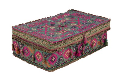 Lot 66 - A QAJAR POLYCHROME-COTTON WOVEN QUR’AN BOX