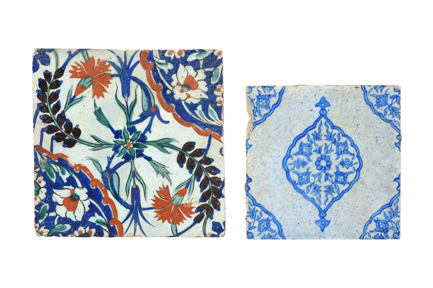 Lot 144 - TWO IZNIK-STYLE KUTAHYA POTTERY TILES