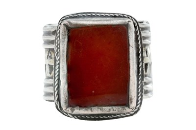 Lot 97 - A TURKMEN CARNELIAN-SET SILVER RING
