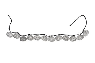 Lot 147 - A DEVOTIONAL SHI'A CHOKER NECKLACE WITH THE NAMES OF THE FOURTEEN INFALLIBLES (CAHARDAH MA'SUMIN)