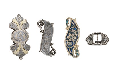 Lot 76 - FOUR CAUCASIAN SILVER, NIELLO AND ENAMEL BELT ORNAMENTS