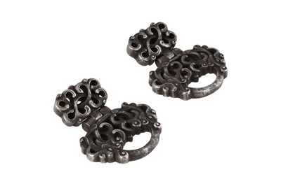 Lot 98 - TWO OPENWORK STEEL BELT FITTINGS WITH DRAGON HEADS