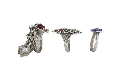Lot 157 - THREE RURAL NORTHERN INDIAN SILVER AND ENAMEL RINGS