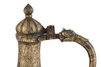 Lot 184 - A MUGHAL-STYLE INDIAN BRASS EWER