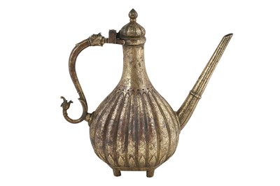 Lot 184 - A MUGHAL-STYLE INDIAN BRASS EWER