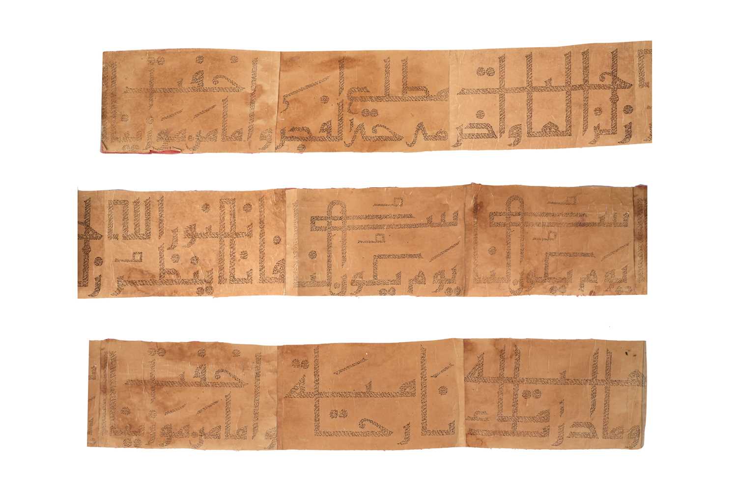 Lot 61 - A KUFIC-STYLE GHUBARI SCROLL WITH ISLAMIC PRAYERS