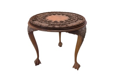 Lot 125 - A KASHMIRI CARVED HARDWOOD ROUND TABLE WITH FLORAL MOTIFS