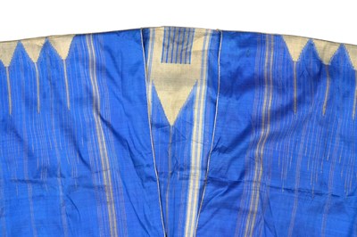 Lot 83 - AN IRAQI BROCADED INDIGO BLUE SILK ABA ROBE (ABAYA)