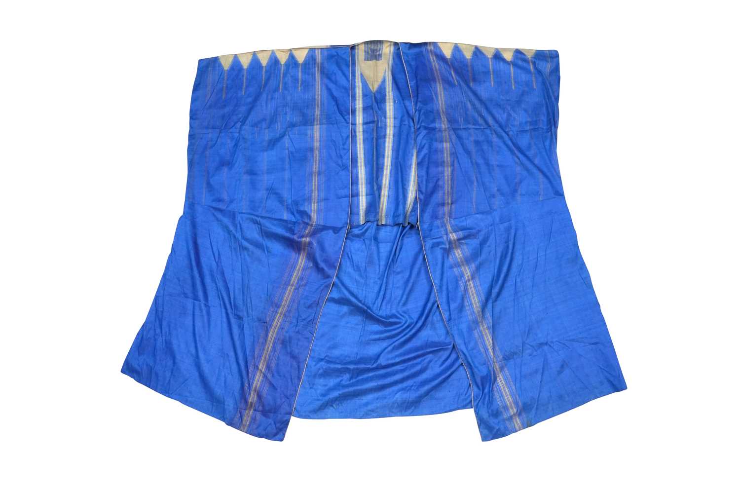 Lot 83 - AN IRAQI BROCADED INDIGO BLUE SILK ABA ROBE (ABAYA)