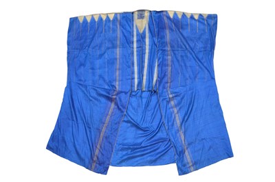 Lot 83 - AN IRAQI BROCADED INDIGO BLUE SILK ABA ROBE (ABAYA)