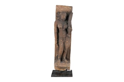 Lot 135 - A CARVED SANDSTONE FIGURE OF A YAKSHINI (NATURE SPIRIT)