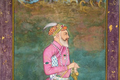 Lot 144 - A STANDING PORTRAIT OF A MUGHAL NOBLEMAN IN PINK DRESS
