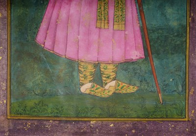 Lot 144 - A STANDING PORTRAIT OF A MUGHAL NOBLEMAN IN PINK DRESS