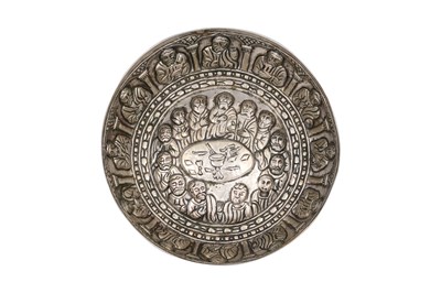 Lot 69 - A CHRISTIAN REPOUSSÉ SILVER TAZA WITH THE LAST SUPPER AND THE TWELVE APOSTLES