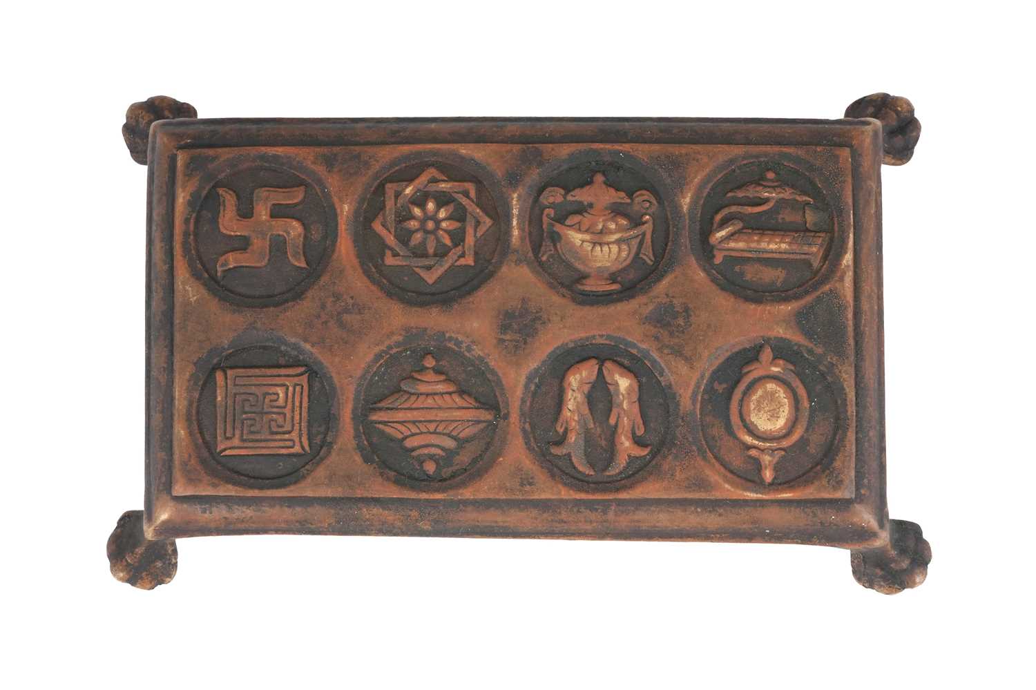 Lot 121 - A BUDDHIST CAST BRONZE RITUAL STAND WITH THE ASHTAMANGALA (EIGHT AUSPICIOUS SYMBOLS)
