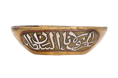Lot 39 - A FIGURAL AND CALLIGRAPHIC SILVER AND COPPER-INLAID BRASS DRINKING CUP
