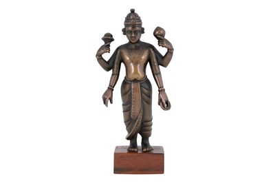 Lot 175 - A DEVOTIONAL BRONZE FIGURINE OF THE HINDU GOD VISHNU