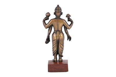Lot 175 - A DEVOTIONAL BRONZE FIGURINE OF THE HINDU GOD VISHNU