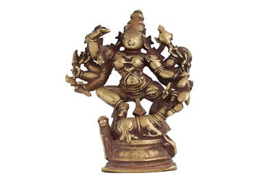 Lot 130 - A BRASS FIGURINE OF THE HINDU GODDESS DURGA MAHISHASURAMARDINI
